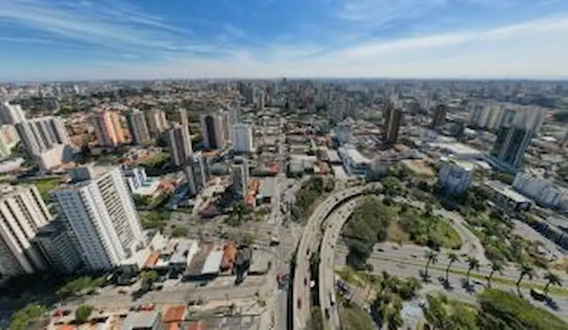 Vista aérea do Bairro Jardim Santo André, com grandes avenidas e muitos prédios.